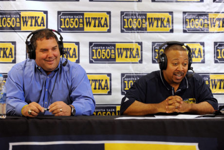 Michigan football head coach Brady Hoke, left, talks with WTKA host Sam Webb on the radio at the M-Den during the WTKA Mott Takeover fundraising event. Angela J. Cesere | AnnArbor.com